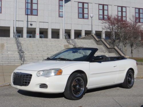 White convertible low miles 88k selling at no reserve power roof dealer trade