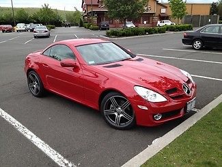 Red 3.0l convertible amg sport rims leather heated seats automatic ipod low mile