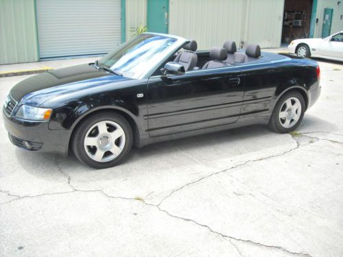 Audi a4 black on black,1.8 turbo,no reserve,loaded,at,ac,like new.