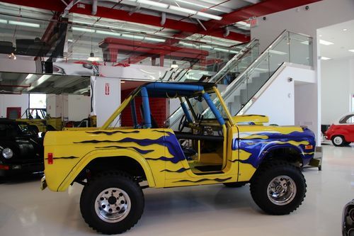 1970 ford bronco yellow with flames has 302 engine automatic  transmission 4x4
