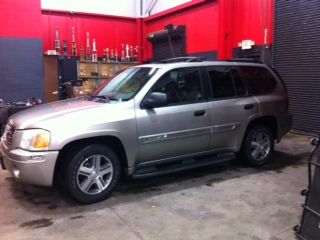 2002 gmc envoy with sunroof and denali rims