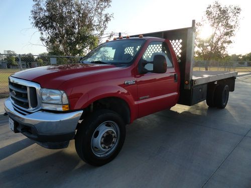 2004 ford f550 w/ 12 foot flatbed in excellent condition