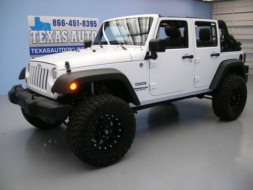 We finance!!!  2011 jeep wrangler unlimited sport 4x4 auto lift soft top 1 owner