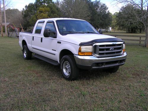 1999 7.3 diesel f250 4x4 crewcab lariat - white