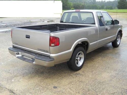 Beige, chevy s10, ext. cab, 6cyl