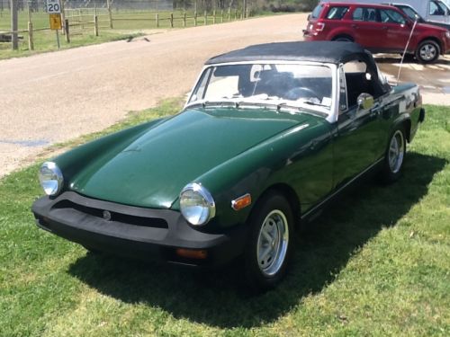 1976 mg midget convertible green with a black top