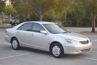 2003 toyota camry le silver, auto, 4cyl 32 mpg, gas saver runs great, no reserve