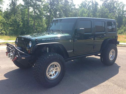2012 jeep wrangler unlimited 37" tires 4" lift winch excellent condition