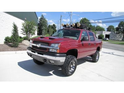 Crew cab! 4x4 lifted! new tires ! serviced !no reserve ! 04