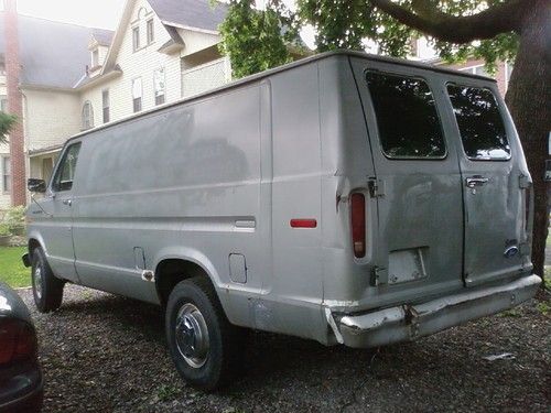 Camper conversion w/ sink, bed, shelving, carpet, insulated. runs well.