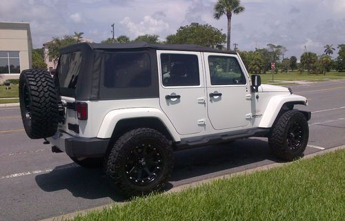 Buy used 2010 Jeep Wrangler Unlimited Sahara Lift Kit 35 ...