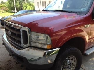2003 ford f-250 super duty fx 4 crew cab pickup 4-door 5.4l with boss plow