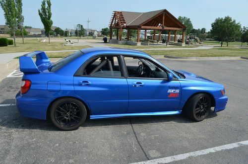 2003 subaru wrx 2.0l turbo, awd, roll cage, 15k in upgrades, faster than sti