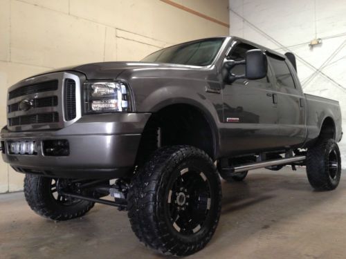 Low miles lifted 2005 ford f250 lariat 4wd fx4 crew cab turbo diesel bulletproof