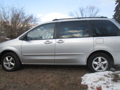 Silver mini van gray interier  passanger seats for 7