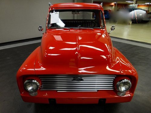 Custom restored 1954 ford f100, red with chrome exhaust stacks