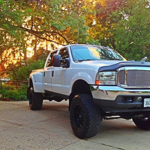Diesel,custom lifted dually 8" icon, open country, sct, arp, fass, procomp mbrp,
