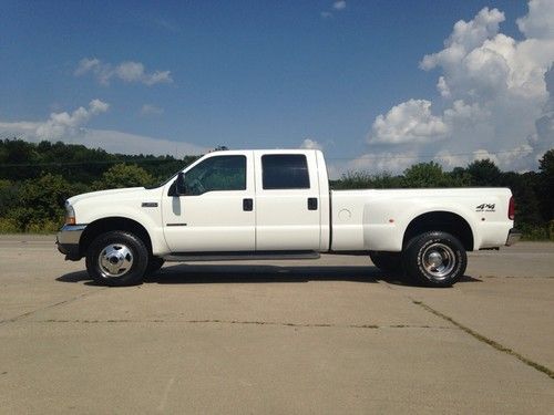 2002 ford f350 4x4 lariat 6 speed dually crew cab no rust low mileage must see!!