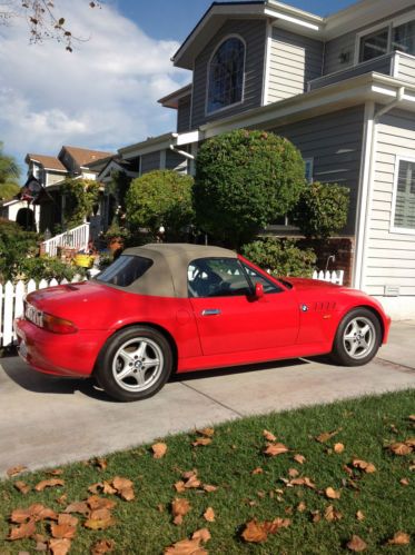 Awesome 1998 bmw z3 automatic 2 door red convertible with tan leather interior.