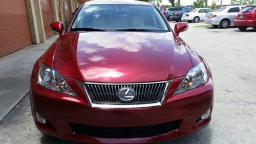 Red color exterior, white leather interior, sedan, is 250, very good condition