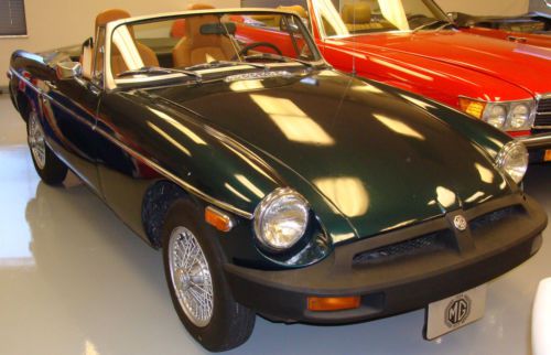 1975 mgb convertible,green,runs good,good condition,(tools,bra,cover included)