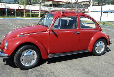 1968 vw classic beetle with chrome roof rack and lots more.