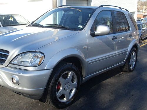 2001 ml 55 amg. hard to find rare suv.silver/black.***look***