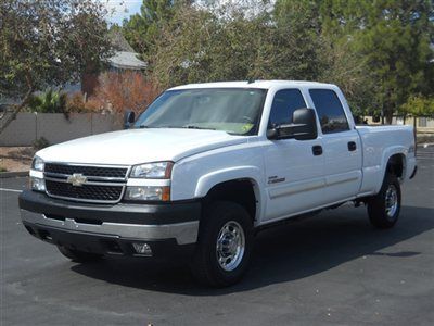 50000 mile duramax, auto and  a 4wd ,they go fast better hurry bob 480-584-8454