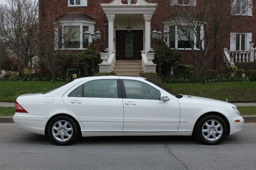 White/tan low miles clean carfax perfect autocheck low reserve