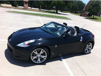 Brand new 2012 370z roadster touring convertible with navigation $49,090 msrp