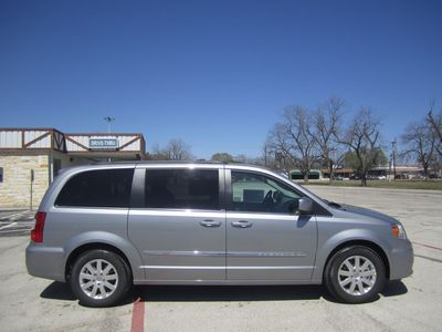 Brand new sleek silver 2013 chrysler town &amp; country touring