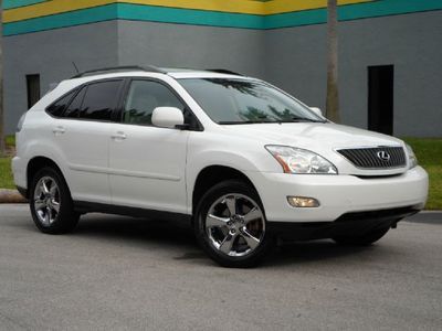 Rx350 pearl white over tan leather sunroof chrome wheels