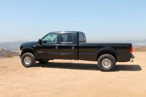 2001 f350 superduty 7.3l v8 turbo diesel crew cab 4 doors  4x2 lifted