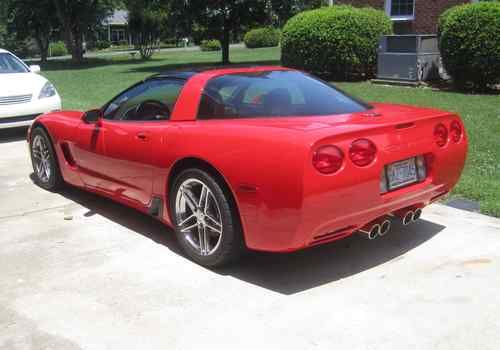 2001corvette hatchback - very low miles, mint red/black, 6-speed, z06 accesories
