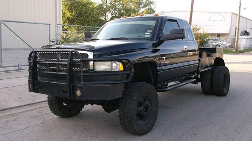 2002 ram 3500 diesel 5.9l lifted 5-sp manual 4x4 flat/service bed ext cab