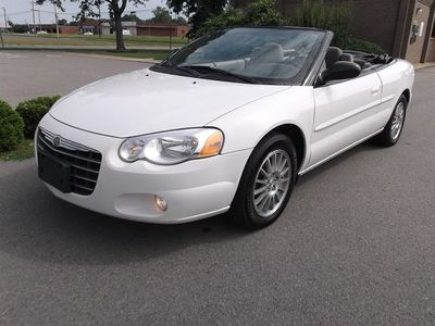 2005 sebring touring convertible, power top, alloys, only 49k miles!! low price!