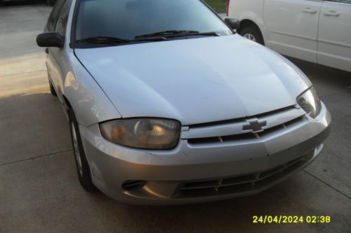 2003 chevy cavalier. silver, clean and good running. cold a/c