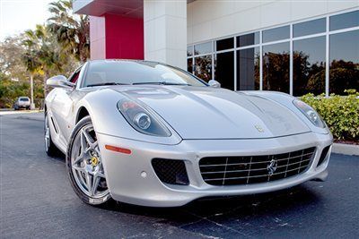599 ferrari factory certified stunner with red interior htge package available
