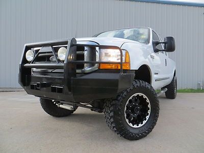 00 f350 (7.3) power-stroke (6spd) lifted mbrp 35s intake bumpers 1-owner tx !!!!