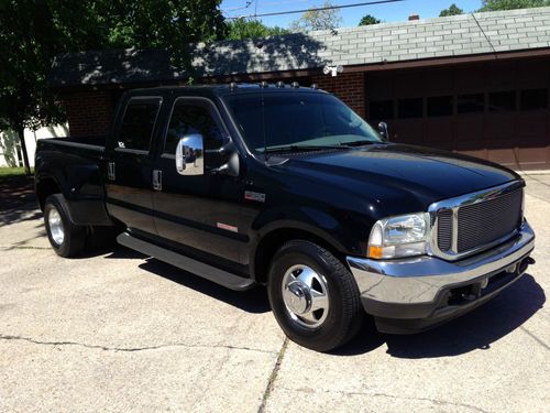 2003 ford f350 dually, diesel, black, low miles, loaded, leather, fanatic owned.