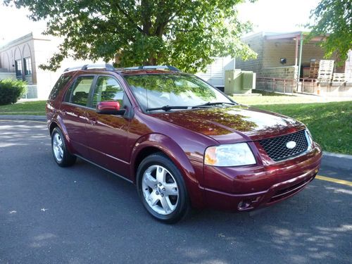 Ford 05 freestyle limited awd leather heated trac 132k cd 7 pass sharp! no resv!