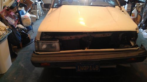 For parts: white 1986 nissan sentra automatic without air cond