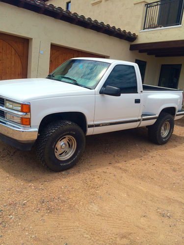 Silverado chevy step side 1500 1/2 ton with 4&#034; suspension lift and new 33&#034; tires