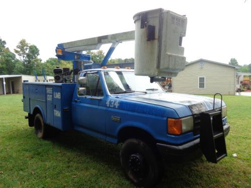 Ford f-super duty custom (efi) truck with boom &amp; bucket mounted on it