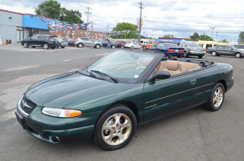 1999 chrysler sebring convertible lather , nice and clean , no reserve