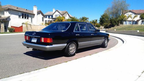 Black mercedes 420sel sedan