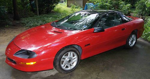 1994 camaro z-28 t-top automatic 5.7 l (remote start, 12" woofer, amps)