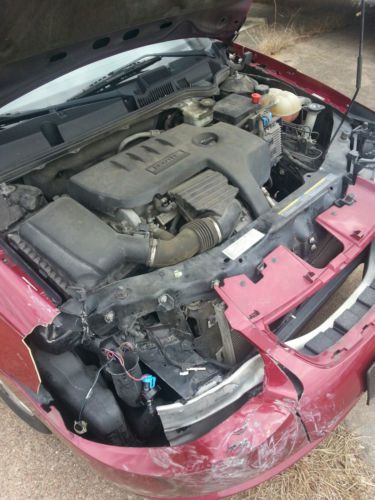 2007 saturn ion 3 sedan 4-door 2.2l red wrecked/totaled