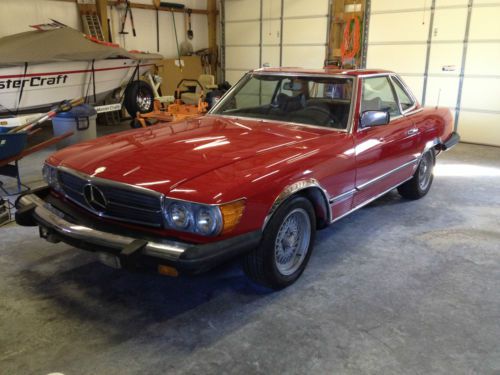 Fresh new red paint, convertible, hard and soft top