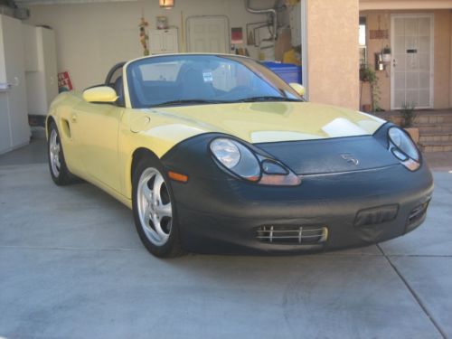 Porsche boxster 1997, 60,000 miles, yellow exterior with black interior, 5-speed